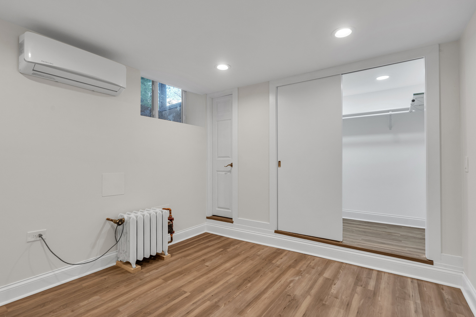 1155 St Johns Avenue, Unit H Highland Park, IL 60035 - Photo 12 of 20 a view of empty room with wooden floor