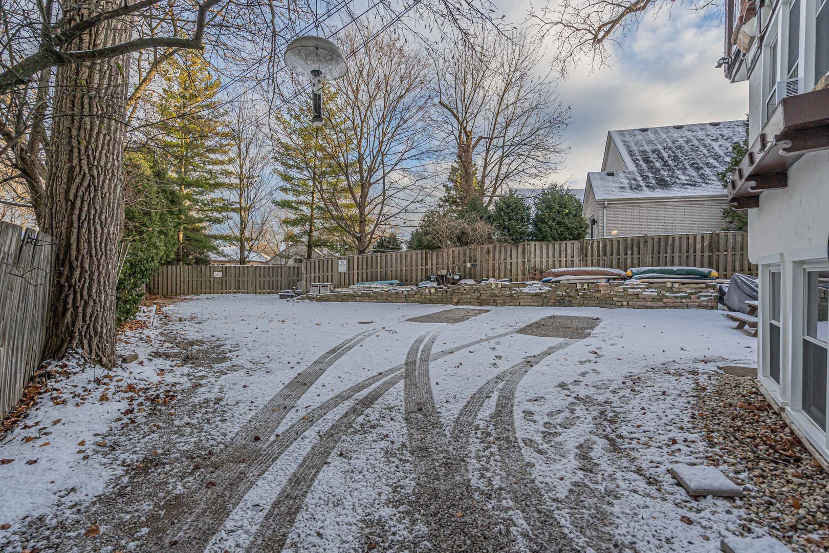 1155 St Johns Avenue, Unit H Highland Park, IL 60035 - Photo 19 of 20 a view of a yard with a tree