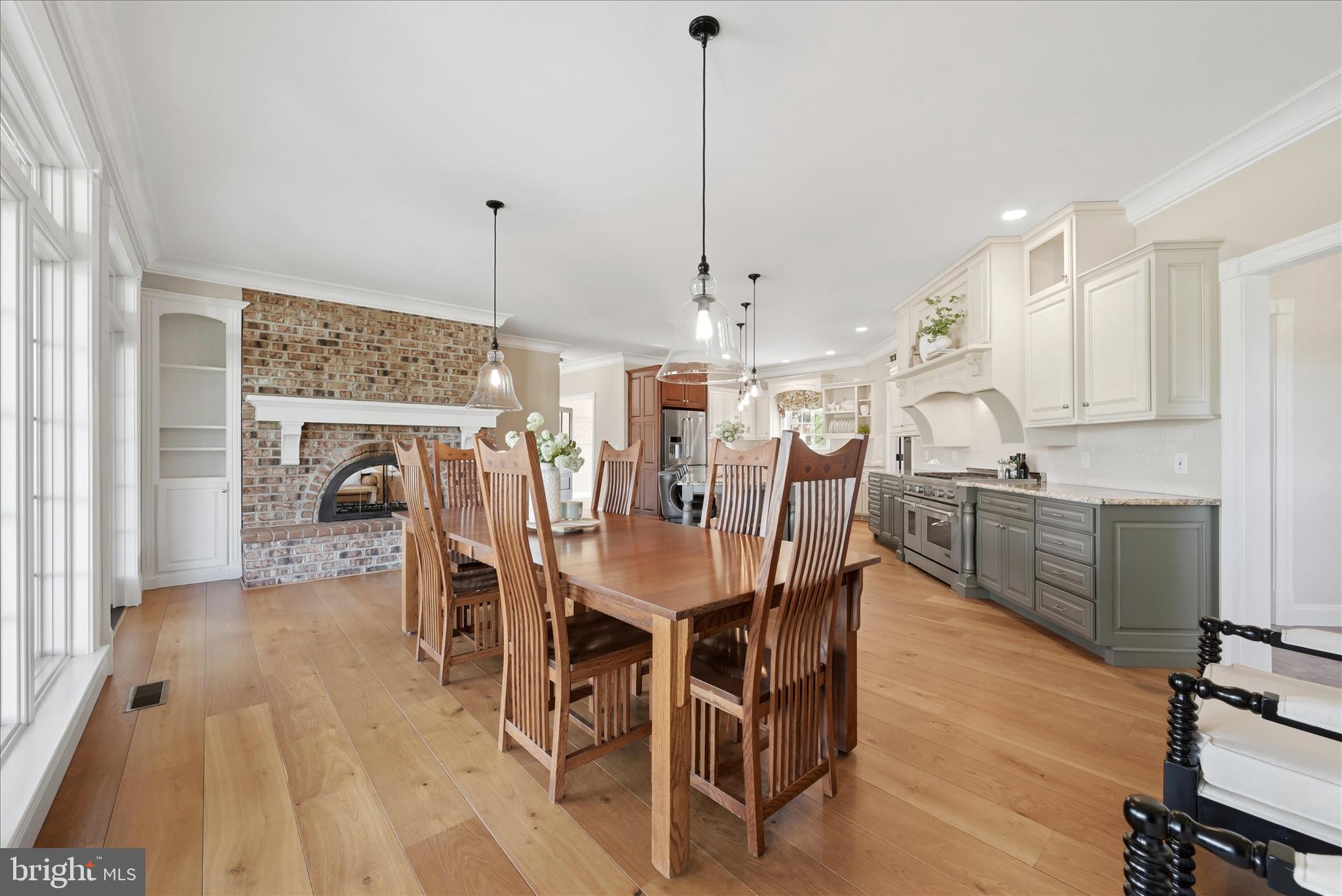 2230 Jones Road Winchester, VA 22602 - Photo 15 of 83 a dining room with furniture a chandelier and wooden floor