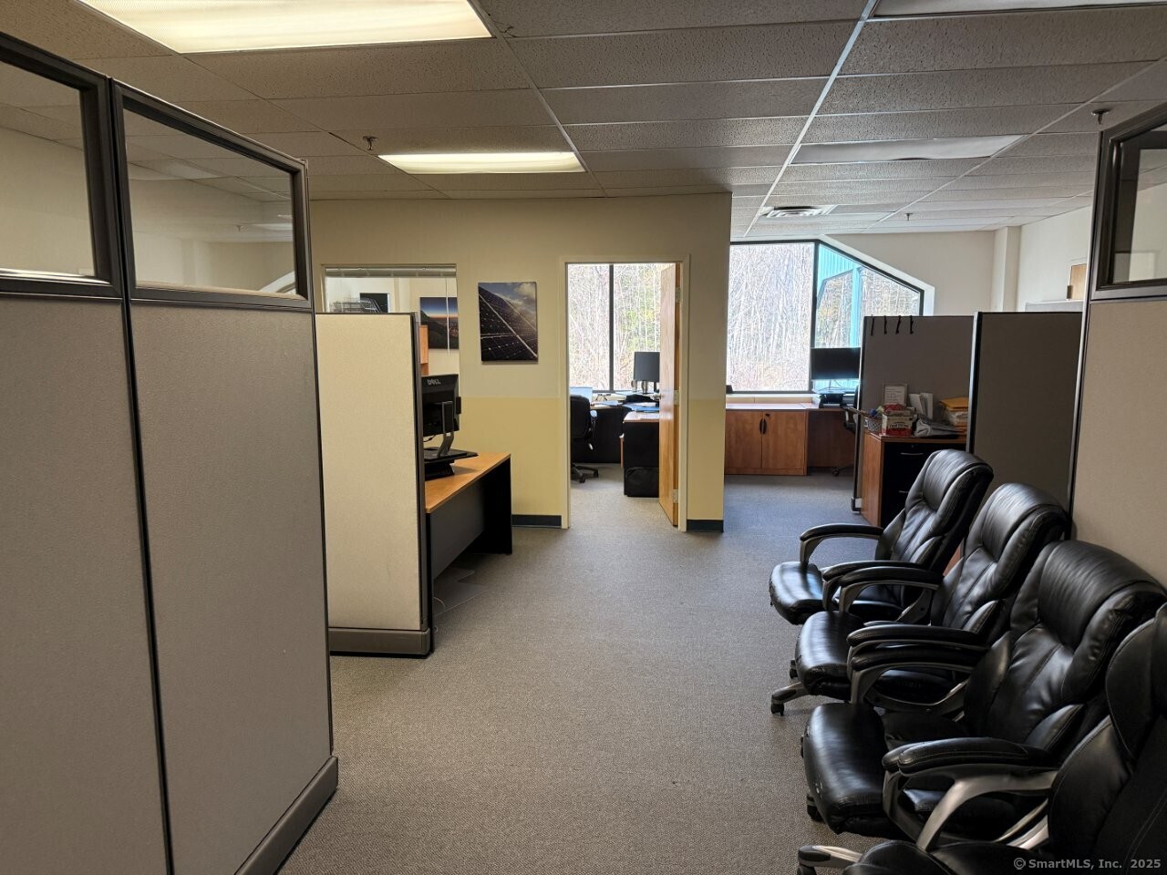 23 Francis J Clarke Circle Bethel, CT 06801 - Photo 7 of 7 a living room with furniture and a flat screen tv