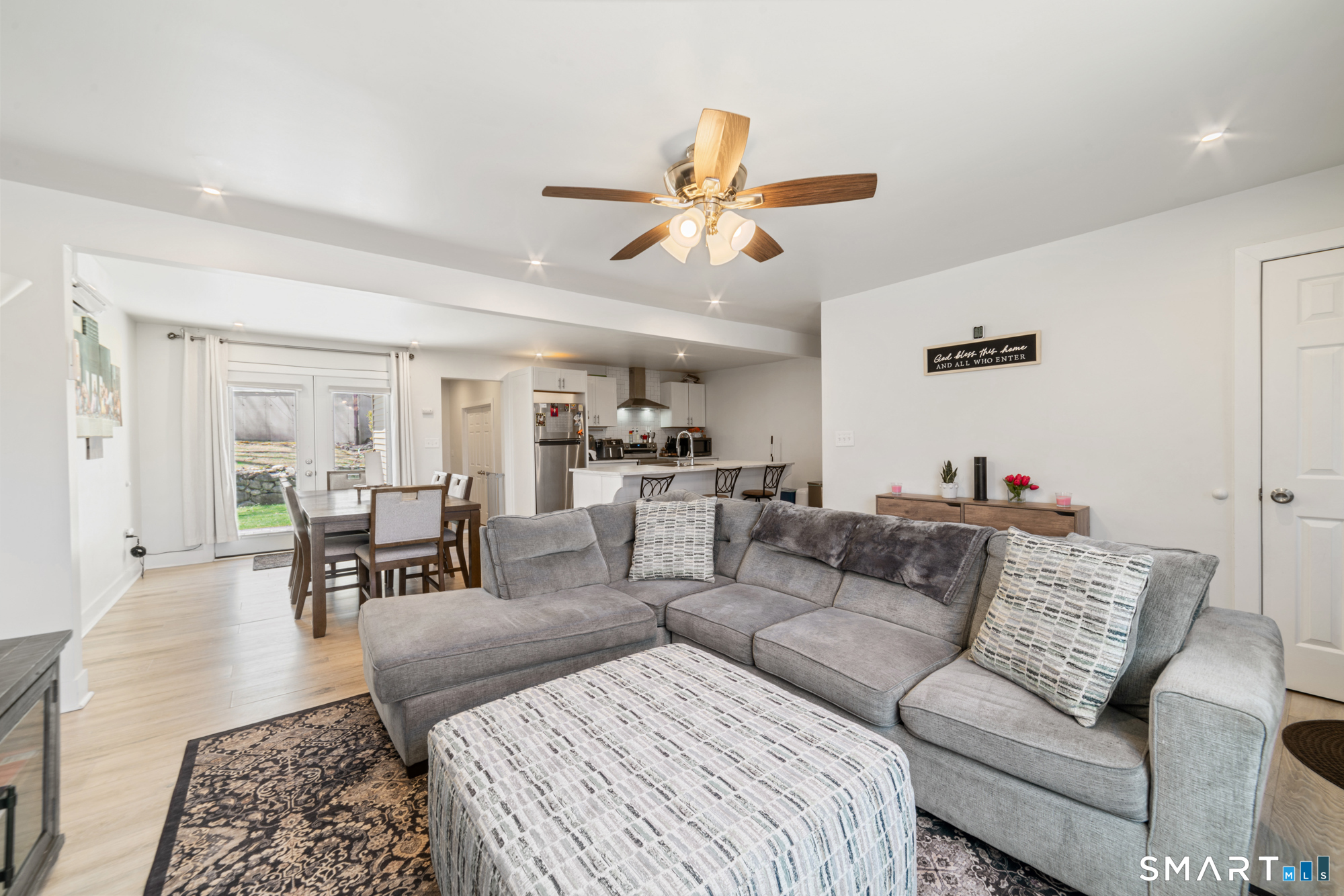 327 Lakeside Boulevard West Waterbury, CT 06708 - Photo 7 of 29 a living room with furniture and a dining table