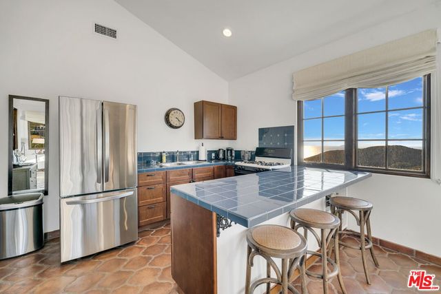 a view of swimming pool with a yard