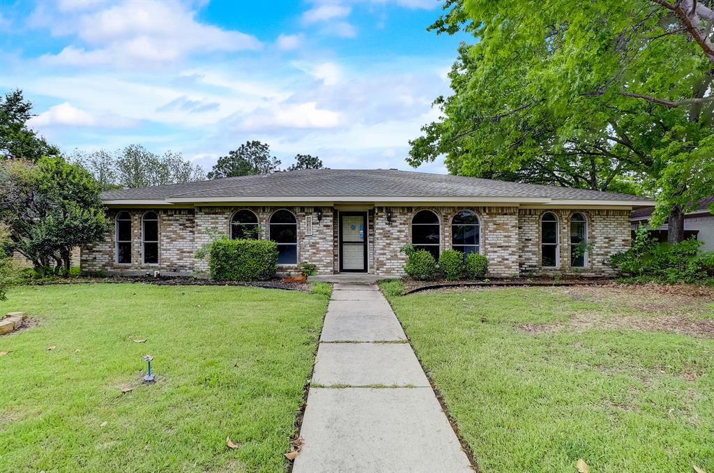 front view of a house and a yard