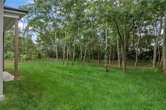 $800,000 | 2620 Northeast Woodland Oak Drive, Lee's Summit, MO 64086