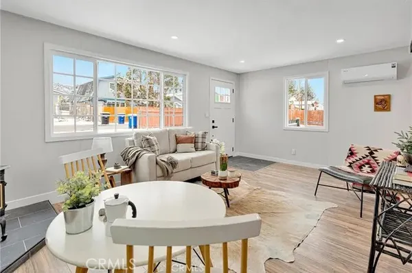 a kitchen with stainless steel appliances granite countertop a refrigerator stove and sink