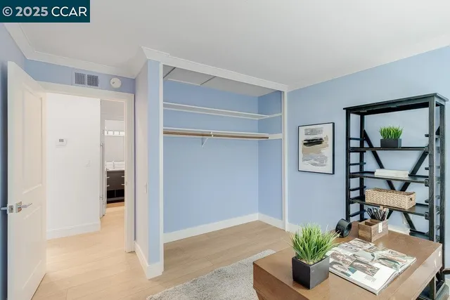 a view of room with window and bench