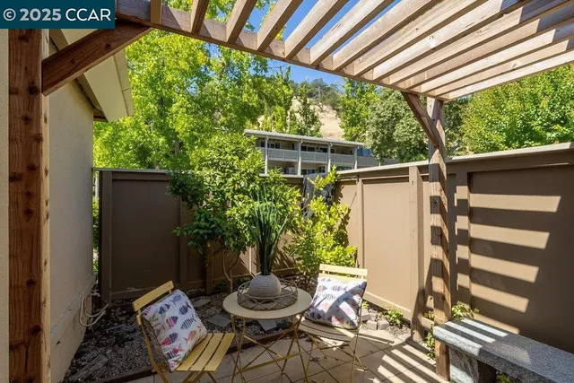 a view of a outdoor seating area with furniture