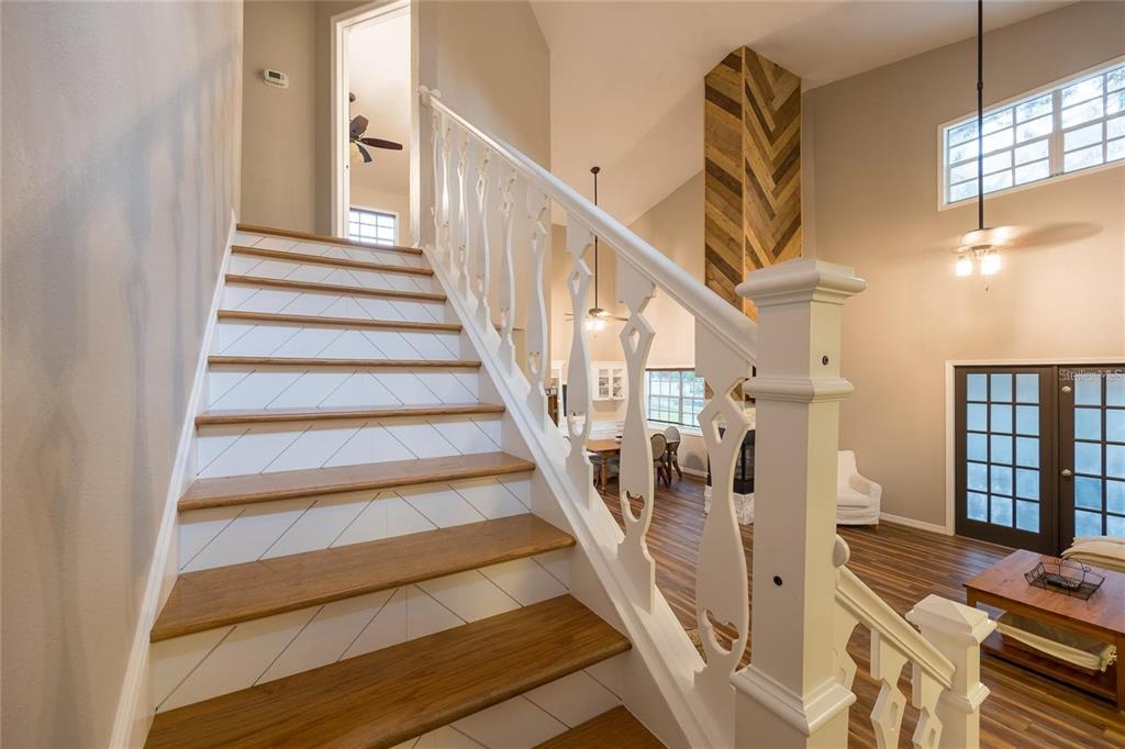 13219 Tyrone Street Hudson, FL 34667 - Photo 15 of 99 a view of entryway and hall with wooden floor