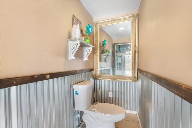 a bathroom with a toilet and a sink