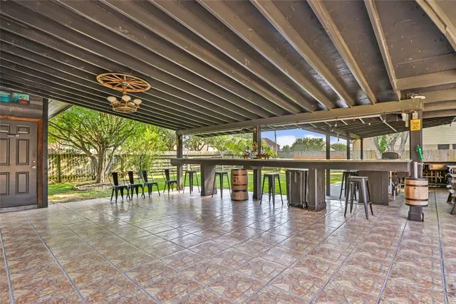 an outdoor space with patio lots of dining space