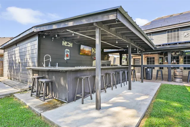 a view of a chair and table in the yard