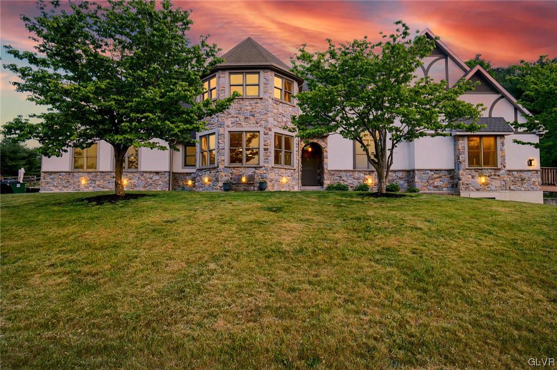 870 Stagecoach Road West Lehighton, PA 18235 - Photo 12 of 50 a front view of a house with a garden and trees