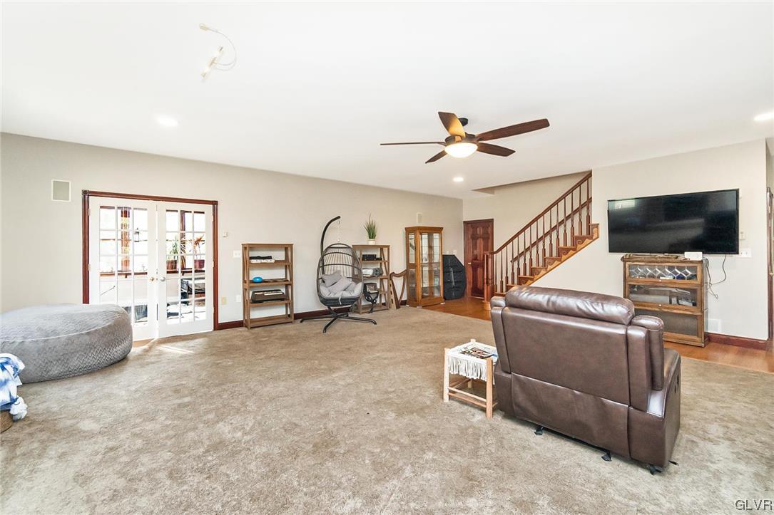 870 Stagecoach Road West Lehighton, PA 18235 - Photo 14 of 50 a living room with furniture and a flat screen tv