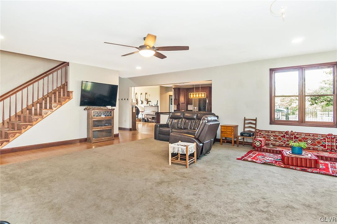 870 Stagecoach Road West Lehighton, PA 18235 - Photo 16 of 50 a living room with furniture and a flat screen tv
