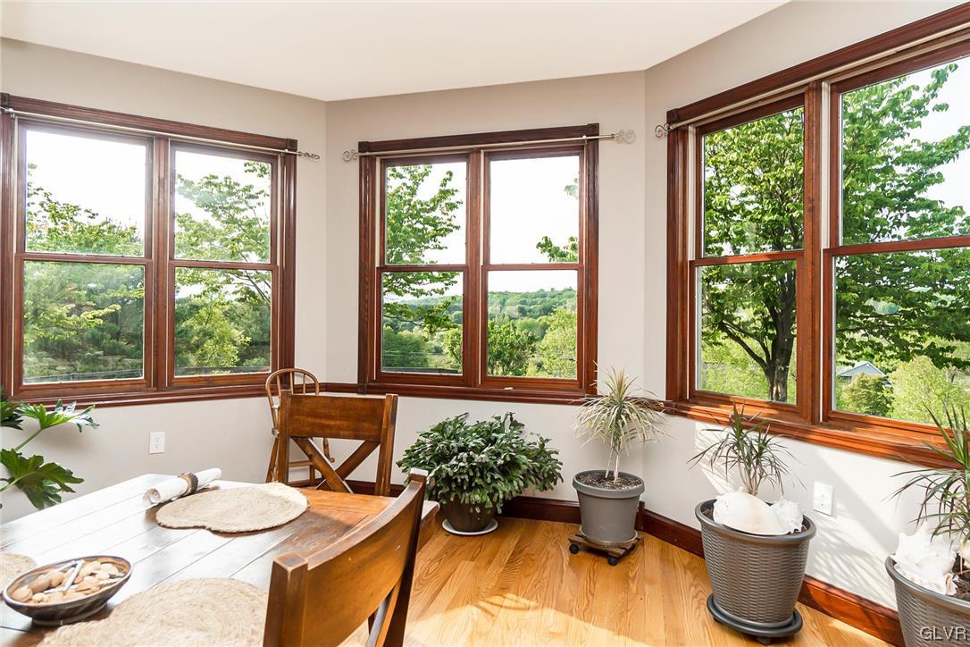 870 Stagecoach Road West Lehighton, PA 18235 - Photo 20 of 50 a dining room with furniture a large window and a potted plant