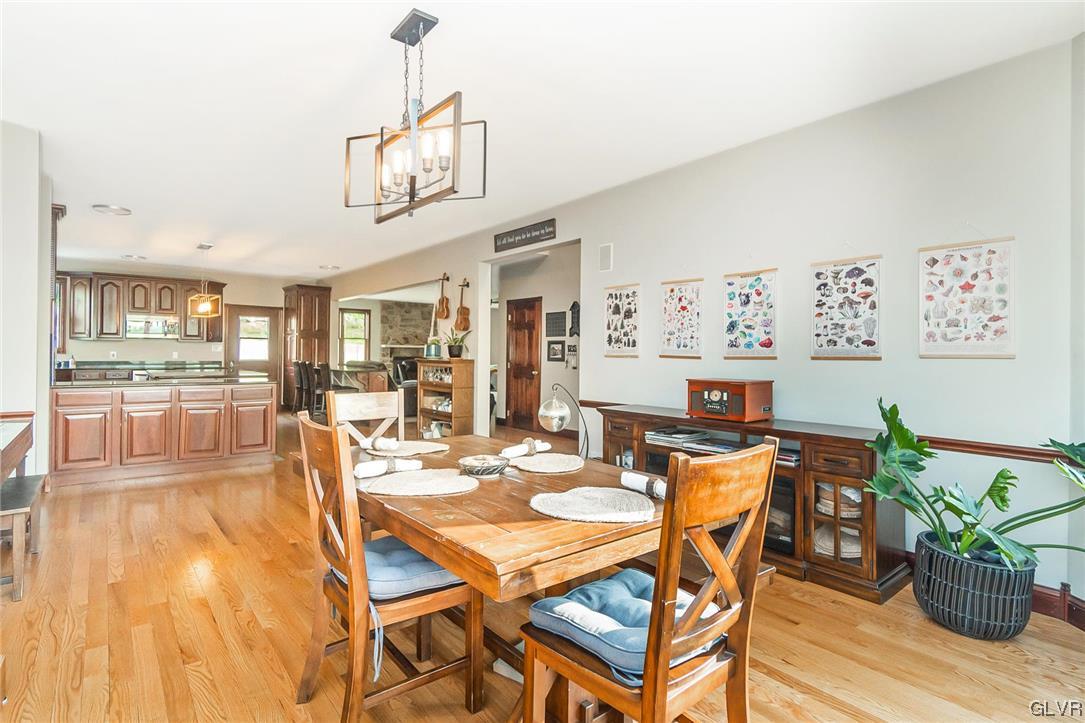 870 Stagecoach Road West Lehighton, PA 18235 - Photo 21 of 50 a dining room with furniture a kitchen view and wooden floor