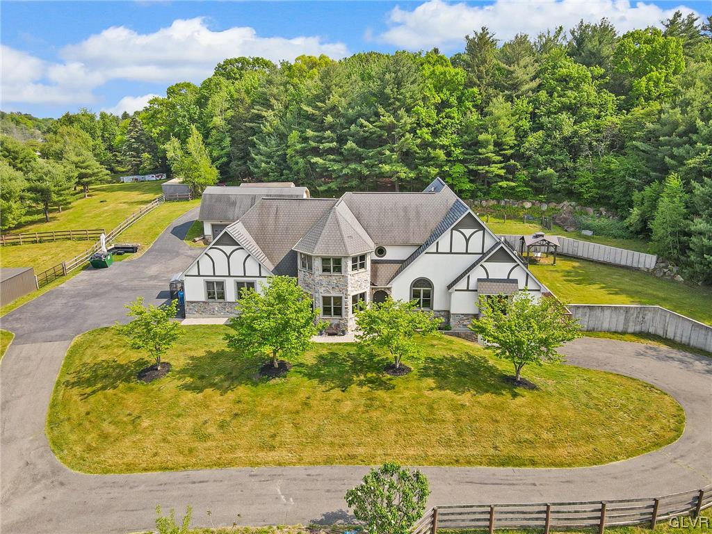 870 Stagecoach Road West Lehighton, PA 18235 - Photo 3 of 50 an aerial view of a house with swimming pool and large trees