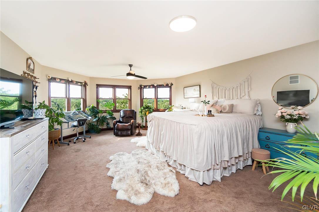 870 Stagecoach Road West Lehighton, PA 18235 - Photo 32 of 50 a bed room with furniture and a flat screen tv