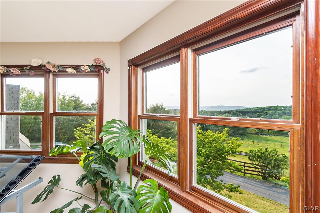870 Stagecoach Road West Lehighton, PA 18235 - Photo 34 of 50 a view of a room with a large window and a potted plant
