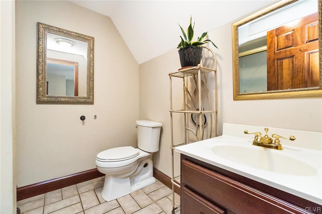 870 Stagecoach Road West Lehighton, PA 18235 - Photo 38 of 50 a bathroom with a sink toilet and mirror