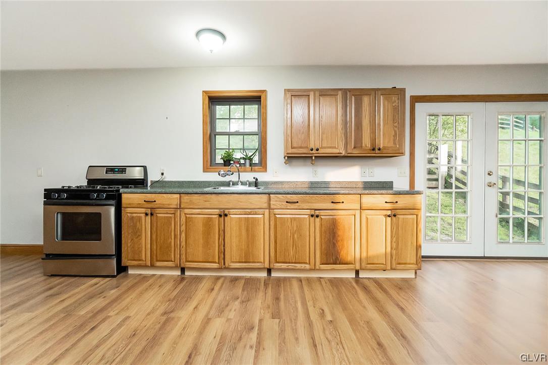 870 Stagecoach Road West Lehighton, PA 18235 - Photo 45 of 50 a kitchen with a stove a sink and a microwave