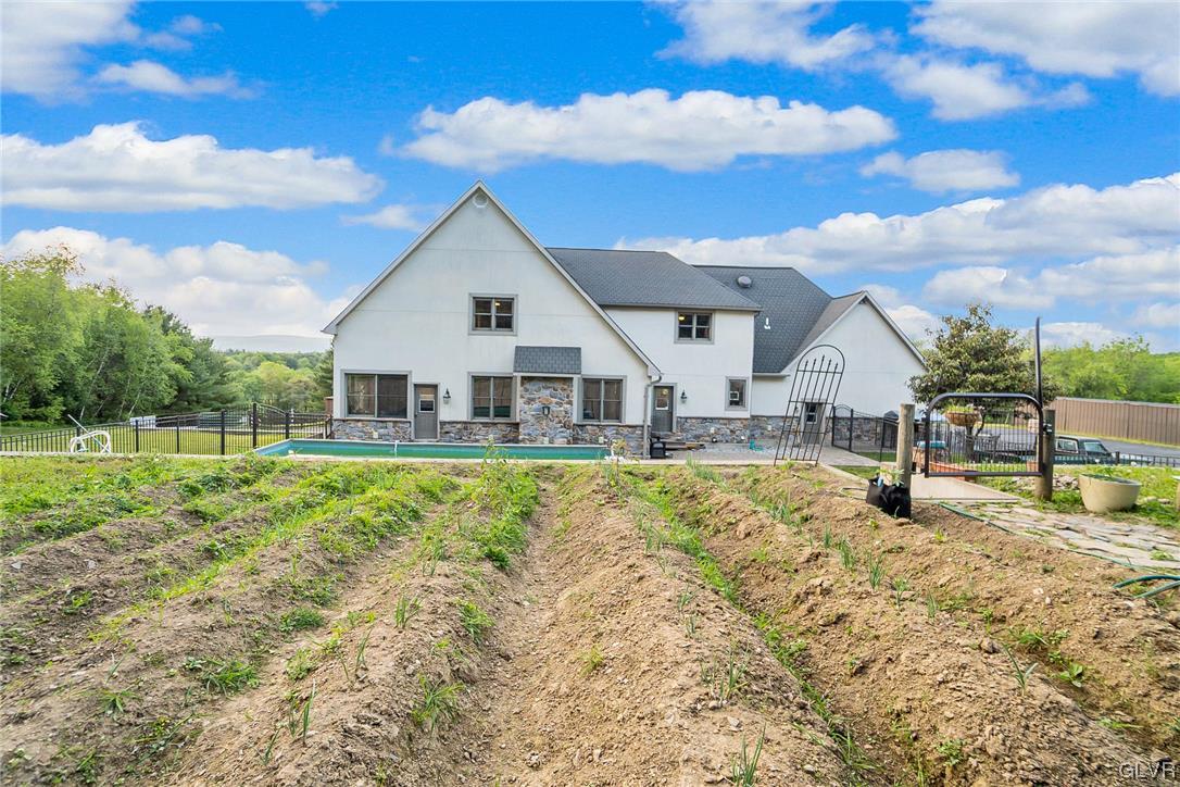 870 Stagecoach Road West Lehighton, PA 18235 - Photo 47 of 50 a view of a house with pool yard and garden