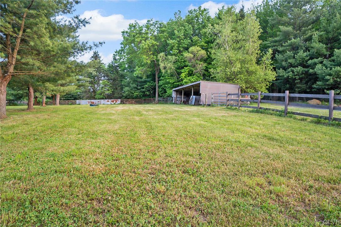 870 Stagecoach Road West Lehighton, PA 18235 - Photo 50 of 50 a backyard of a house with trees and entertaining space