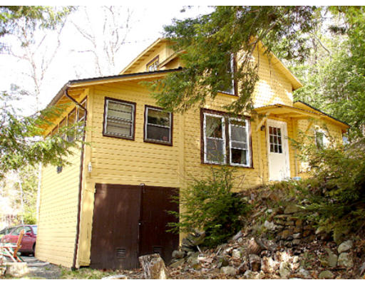 242 Buckland Road Ashfield, MA 01330 - Photo 3 of 7 a view of a house with a tree