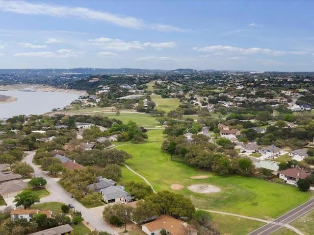 a view of a lake with houses