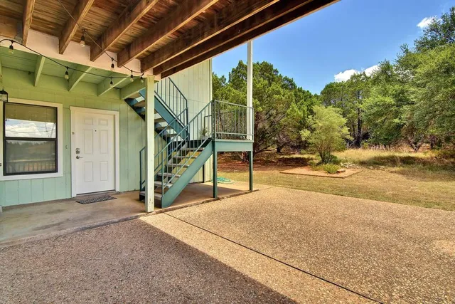 a view of a house with a park