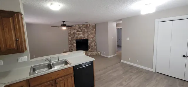 a spacious bathroom with a sink double vanity and a mirror