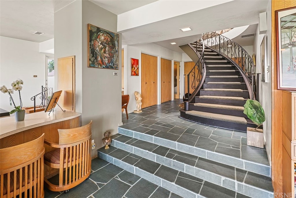 5265 Old Road Riverside, CA 92504 - Photo 12 of 75 a view of entryway with wooden floor and stairs