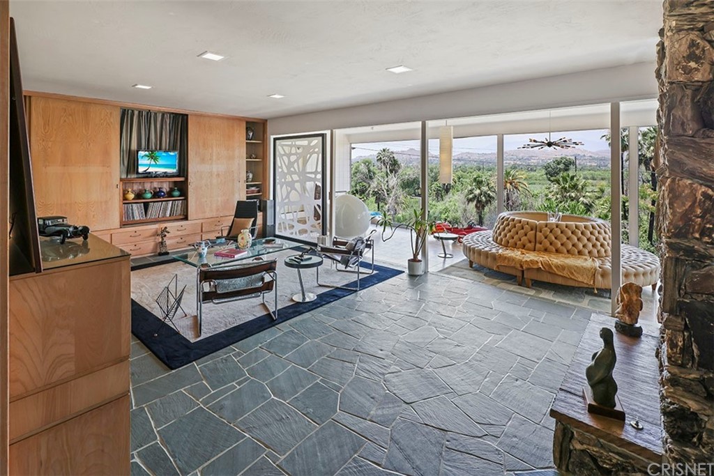 5265 Old Road Riverside, CA 92504 - Photo 13 of 75 a living room with furniture and a floor to ceiling window