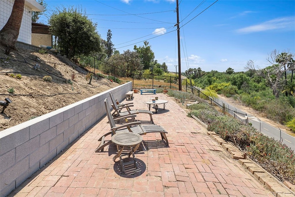 5265 Old Road Riverside, CA 92504 - Photo 31 of 75 a view of a terrace with furniture
