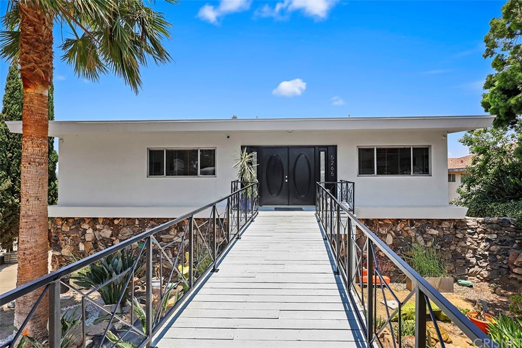 5265 Old Road Riverside, CA 92504 - Photo 5 of 75 a view of a house with wooden deck