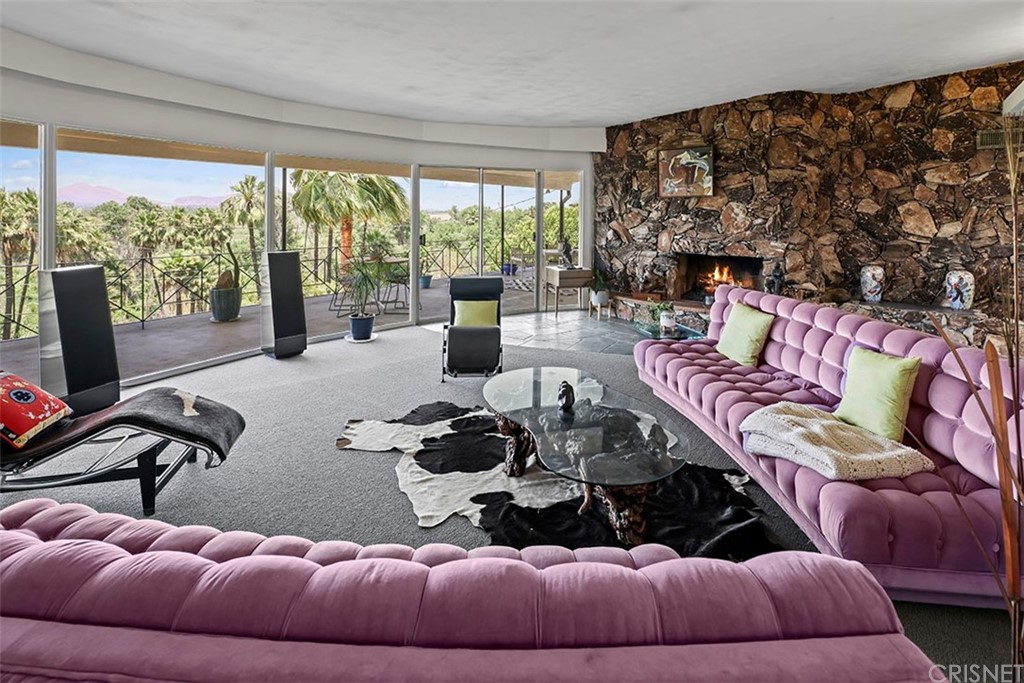 5265 Old Road Riverside, CA 92504 - Photo 44 of 75 a living room with furniture and a floor to ceiling window
