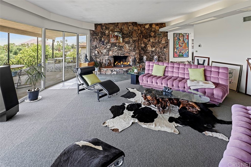 5265 Old Road Riverside, CA 92504 - Photo 45 of 75 a living room with furniture a fireplace and large windows