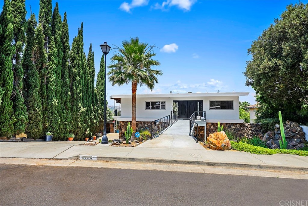 5265 Old Road Riverside, CA 92504 - Photo 6 of 75 a front view of a house with garden and parking