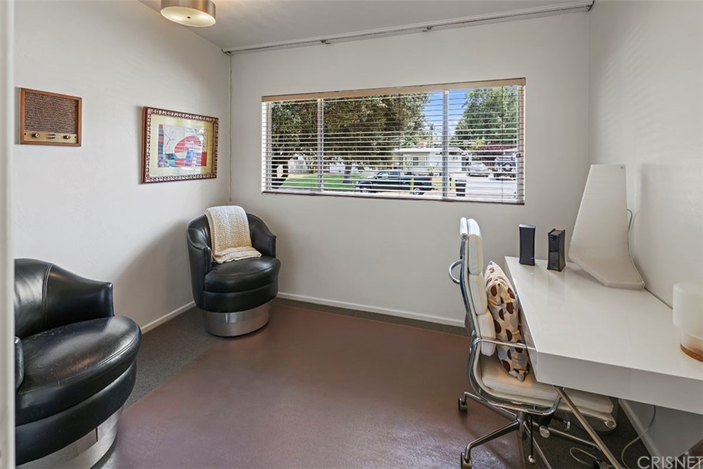 5265 Old Road Riverside, CA 92504 - Photo 52 of 75 a view of a workspace with furniture and a window