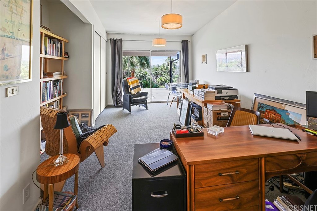 5265 Old Road Riverside, CA 92504 - Photo 54 of 75 a view of a workspace with furniture and a window
