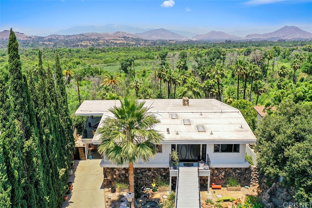 5265 Old Road Riverside, CA 92504 - Photo 70 of 75 an aerial view of a house with a yard and mountain view