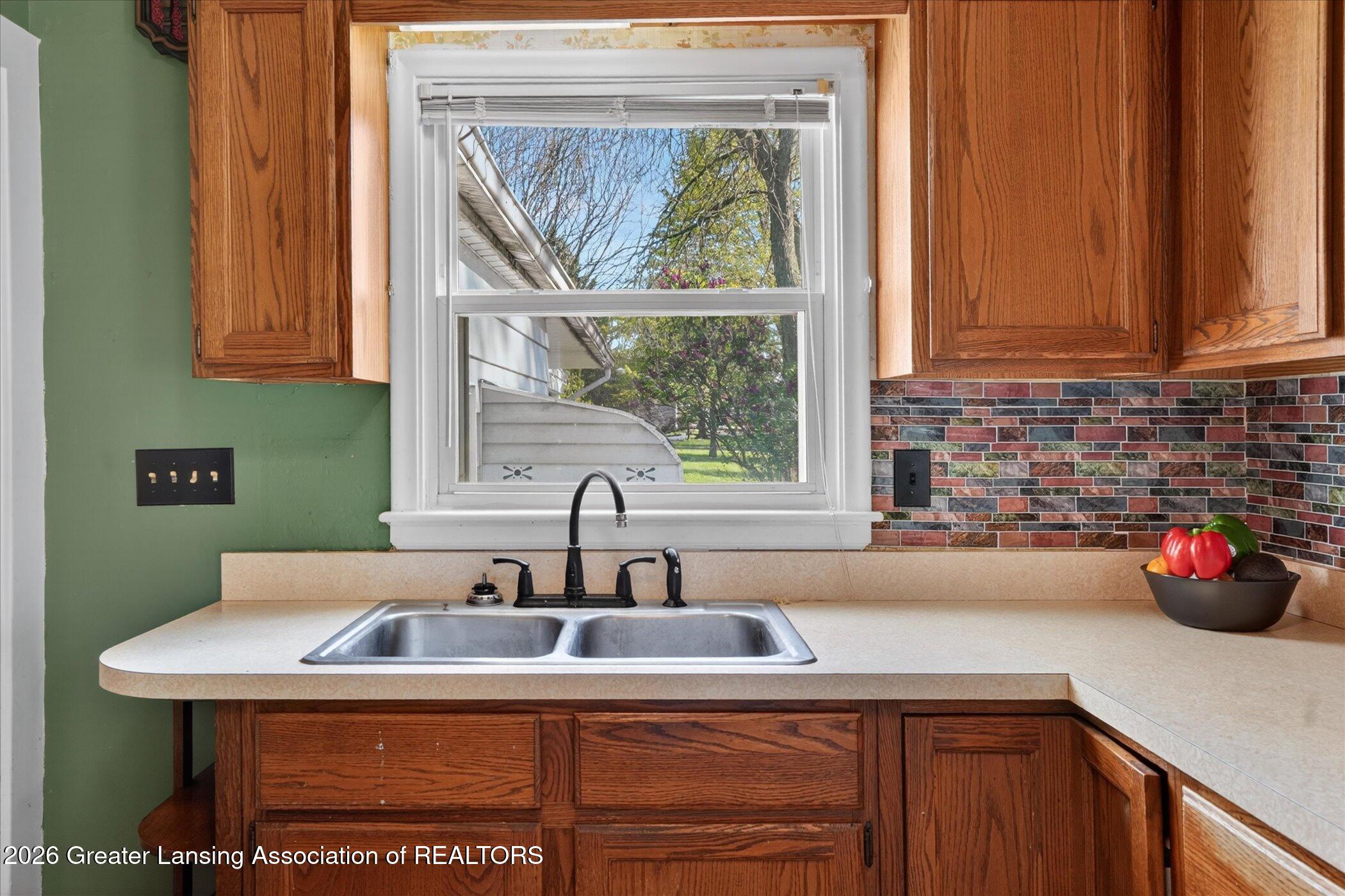 1910 Elmwood Road Lansing, MI 48917 - Photo 15 of 42 18-1910-Elmwood-Rd-Lansing-MI-48917-Wind