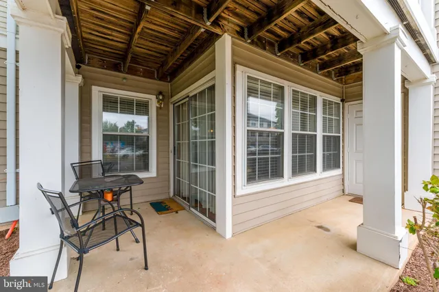 a view of a porch with garden
