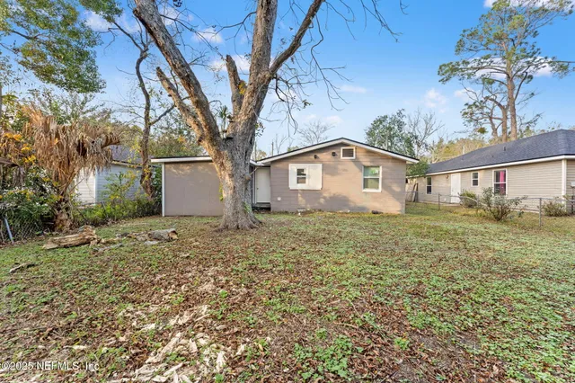 a kitchen with a refrigerator a sink and dishwasher
