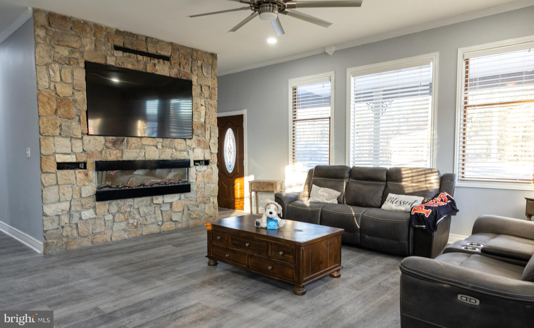 1476 South Orchard Road Vineland, NJ 08360 - Photo 15 of 37 a living room with furniture and a flat screen tv