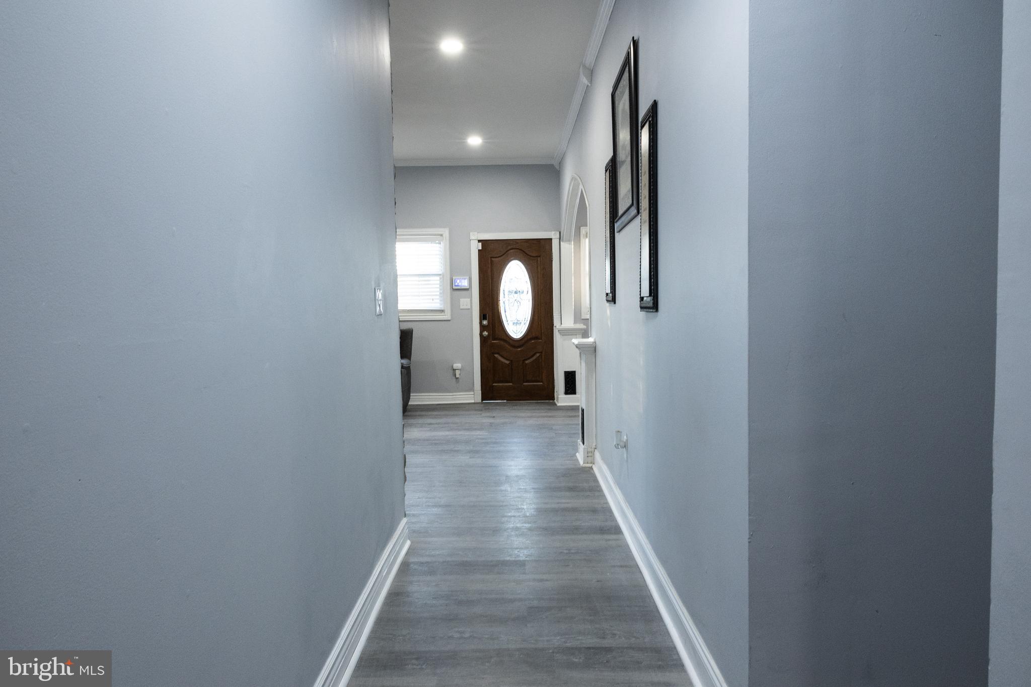 1476 South Orchard Road Vineland, NJ 08360 - Photo 19 of 37 a view of a hallway with wooden floor