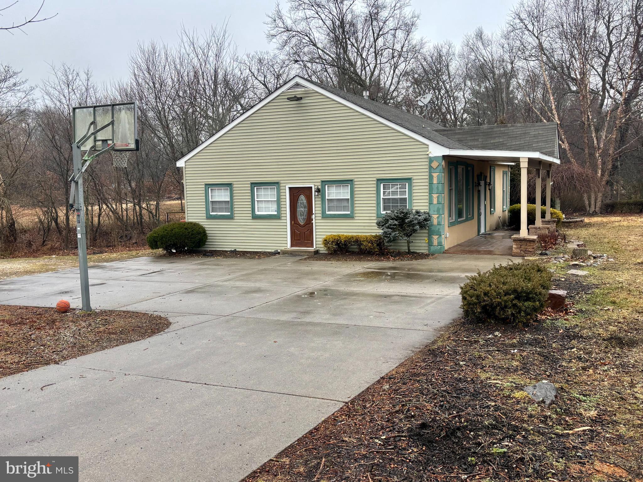 1476 South Orchard Road Vineland, NJ 08360 - Photo 2 of 37 a front view of a house with a outdoor space