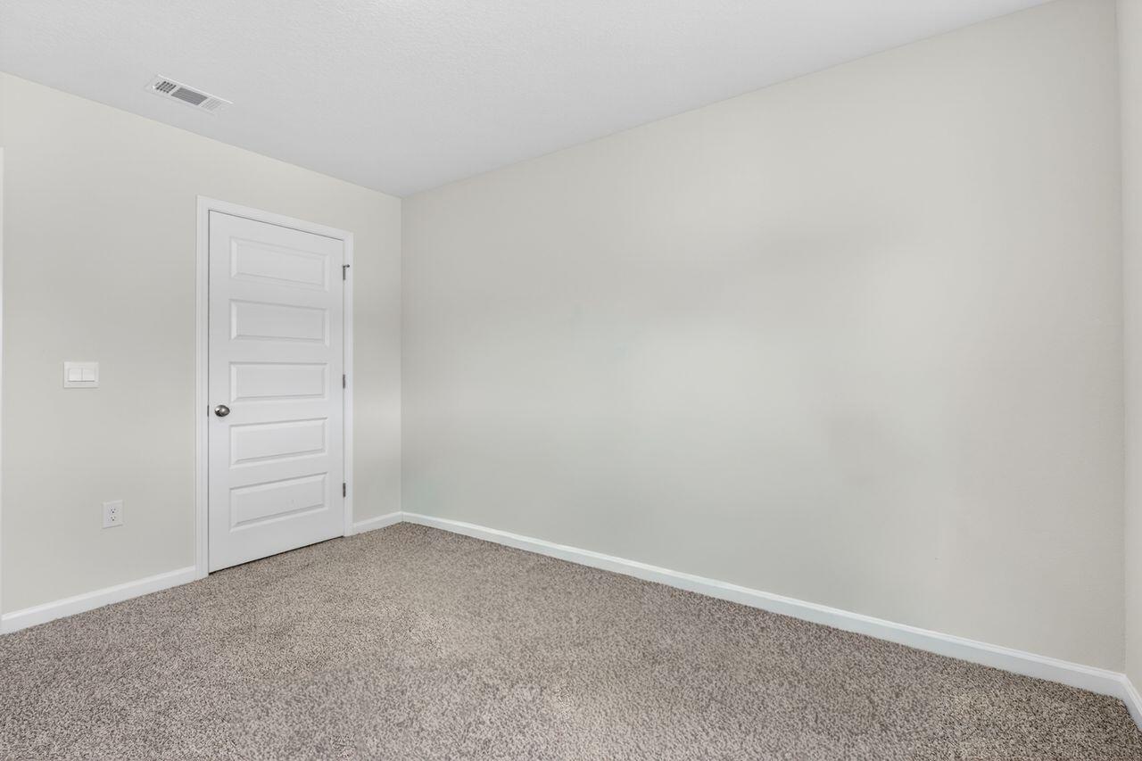 2637 Saltgrass Way Crestview, FL 32536 - Photo 22 of 47 a view of an empty room