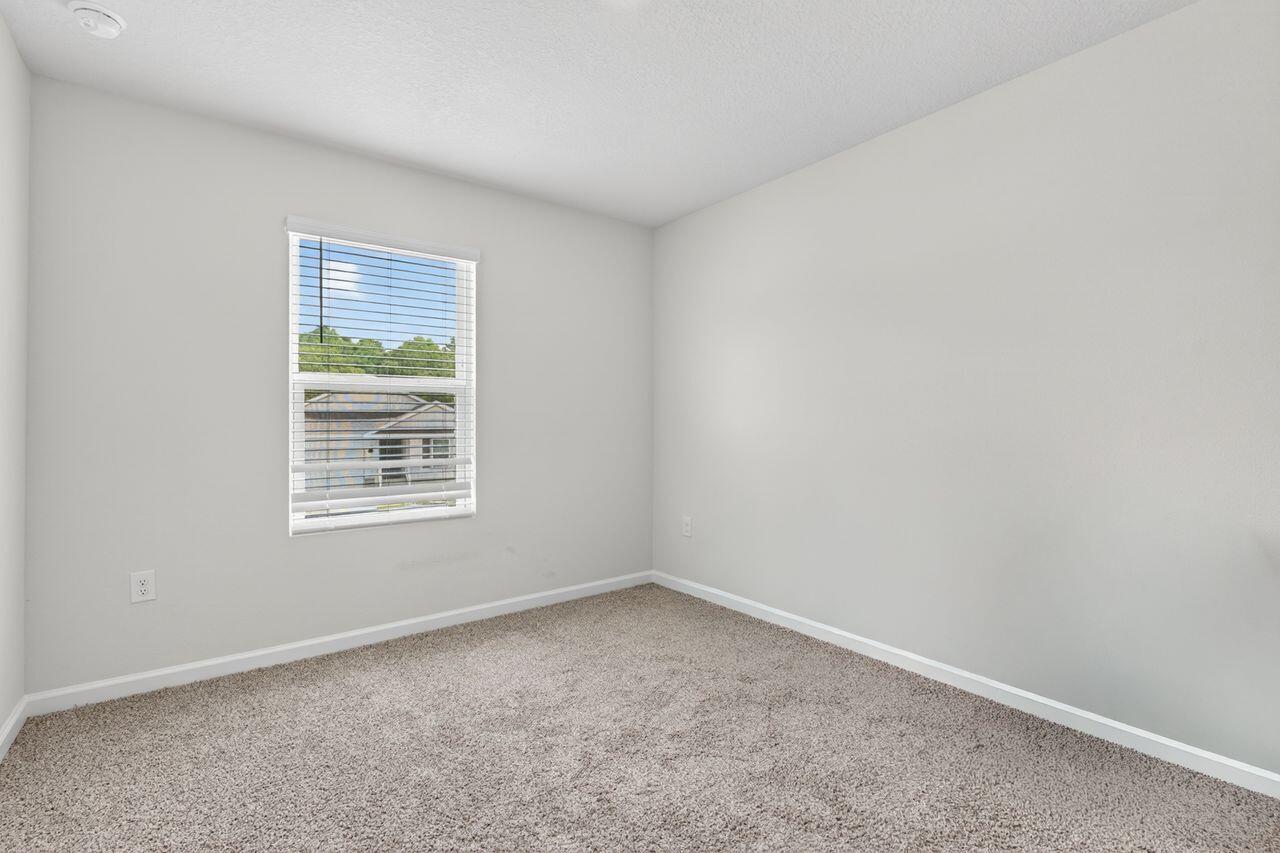 2637 Saltgrass Way Crestview, FL 32536 - Photo 23 of 47 an empty room with a window
