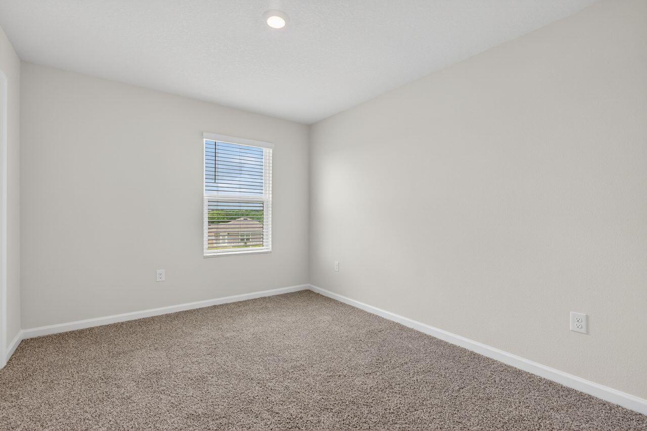 2637 Saltgrass Way Crestview, FL 32536 - Photo 27 of 47 an empty room with a window
